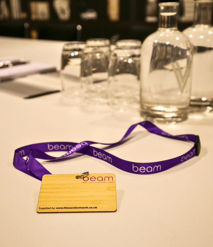 Custom made Wooden Card for Beam UK with a Branded Purple Beam UK Lanyard
