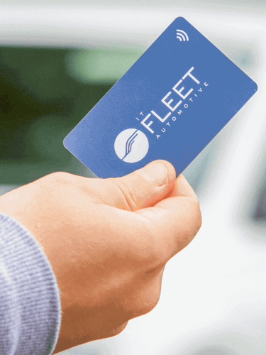 Custom Printed RFID Card for IT Fleet Automotive pictured in front of a vehicle