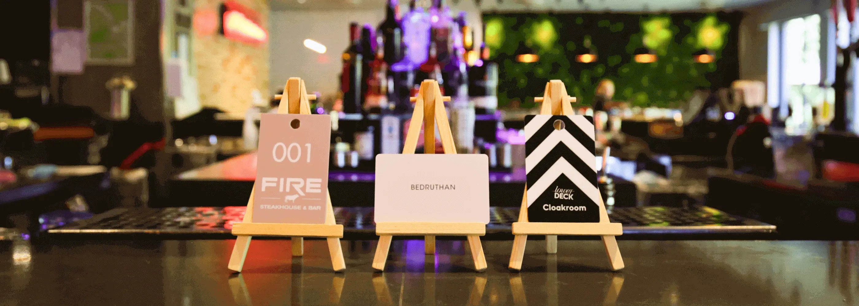 Three Custom Printed Cards ideal for use as cloakroom tags and bar tab cards in the hospitality sector