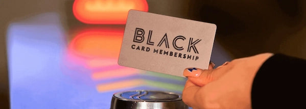 Person holding customer printed membership card