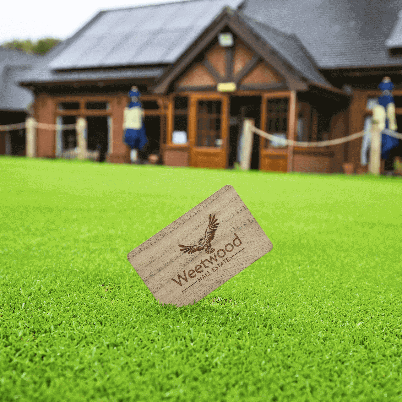 Sustainable Wood Card printed for Weetwood Hall Estate pictured planted in the ground