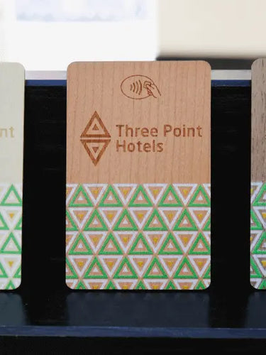Three Wooden Eco Friendly RFID Hotel Key Cards stood side by side