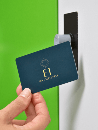 Custom Printed E1 Spa & Wellness Card being held up to a reader