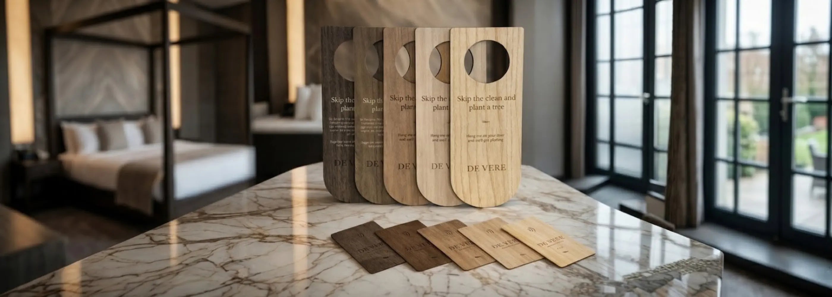 De-Vere hotels wooden do not disturb door hangers and keycards on counter top