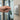 Paxton Switch 2 Green ring Key Fob being held against an electronic keypad to open door