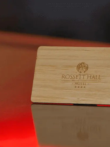 Sustainable wooden RFID card engraved with Rossett Hall Hotel logo